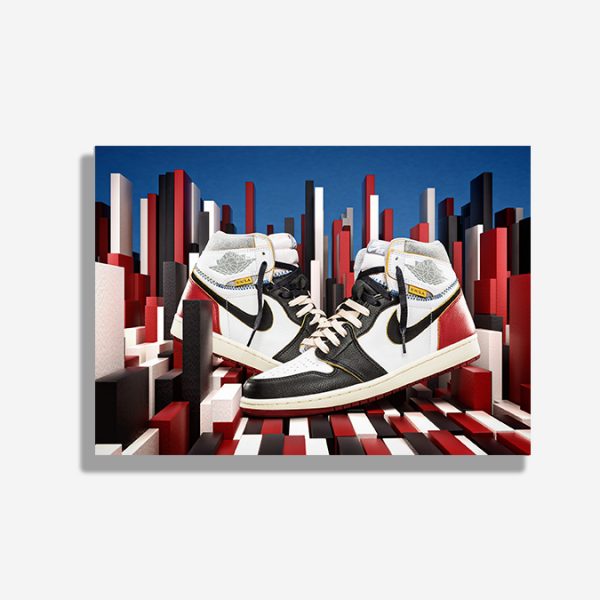 A4 print mockup - The image features a Nike Air Jordan 1 high with the Union Skateboards LA collaboration. The sneakers are sat in a CGI background made up of colourful blocks of different sizes and shapes.