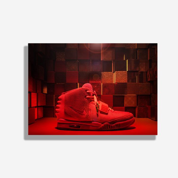 A4 print mockup - The image features a Nike Air Yeezy 2 Red October sneaker. The sneaker is shown in a room made up of spiky red blocks using the texture from the shoes itself.
