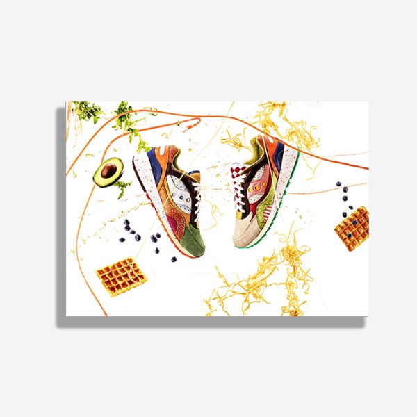 A4 print mockup - The image features the saucony foodfight sneaker in a scene where real food is being thrown around making a big mess
