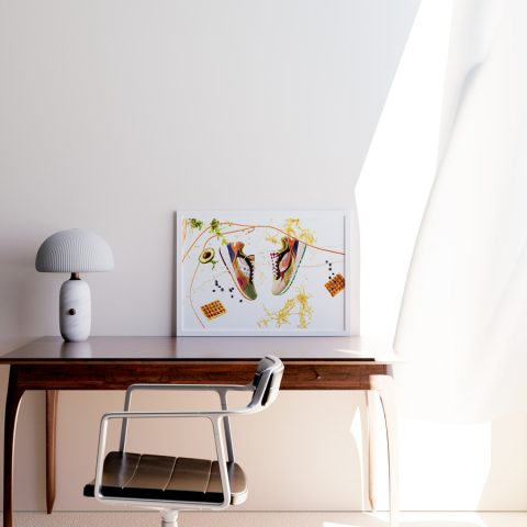 A3 print mockup in a frame on a desk - The image features the saucony foodfight sneaker in a scene where real food is being thrown around making a big mess